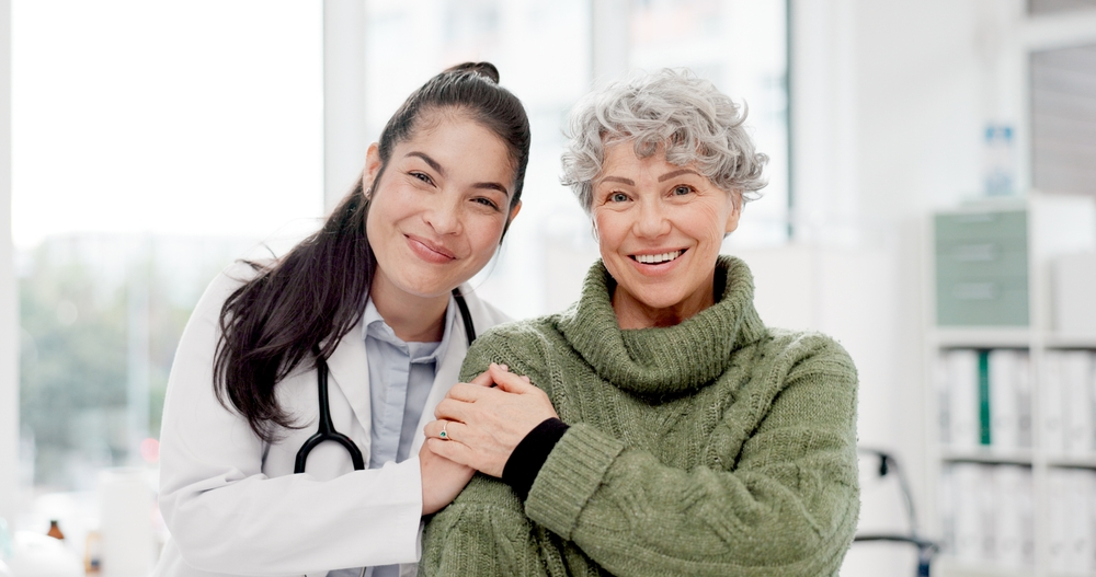 Doctor and patient smiling